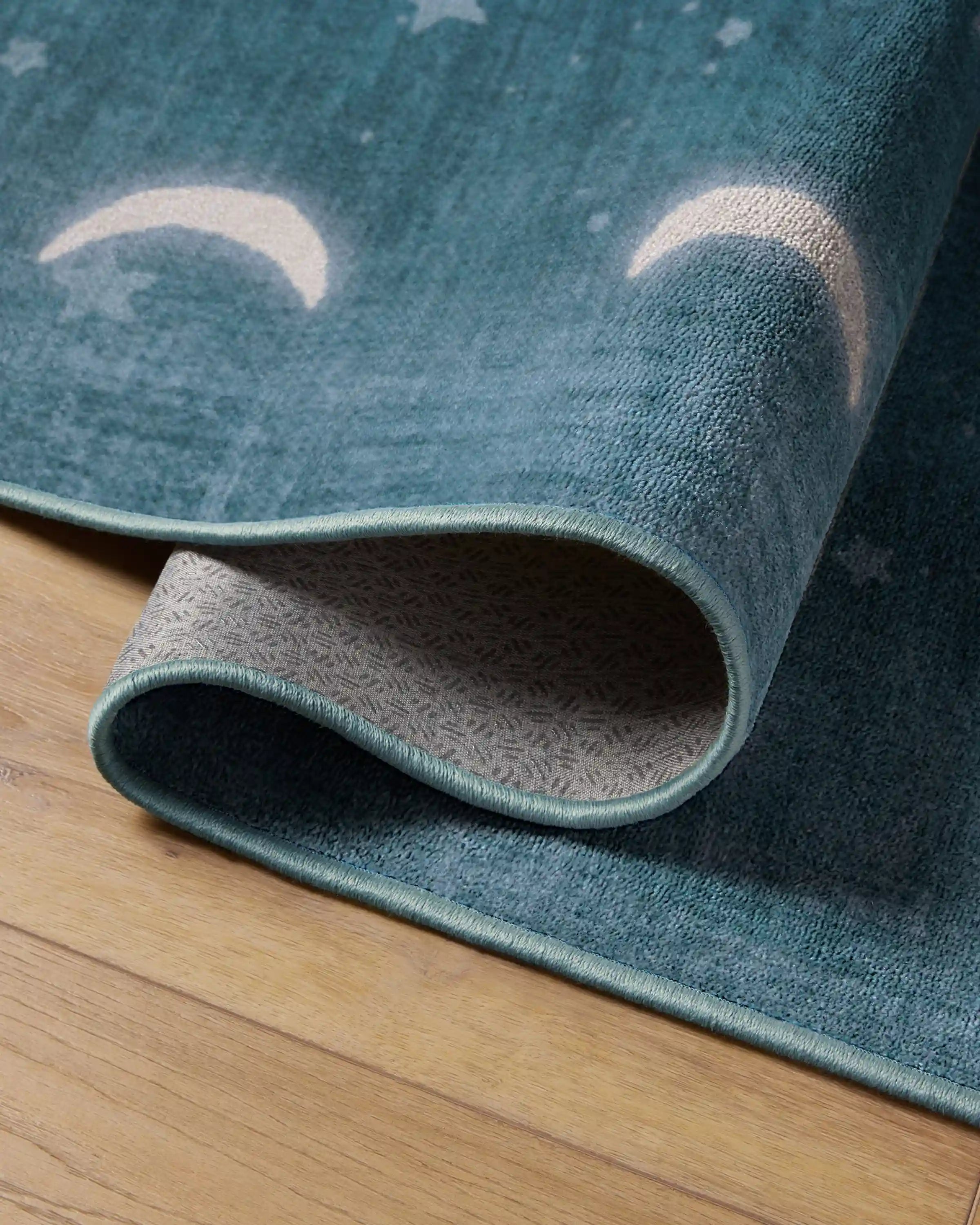 To The Moon And Back Soft Teal Rug by Humberto Leon